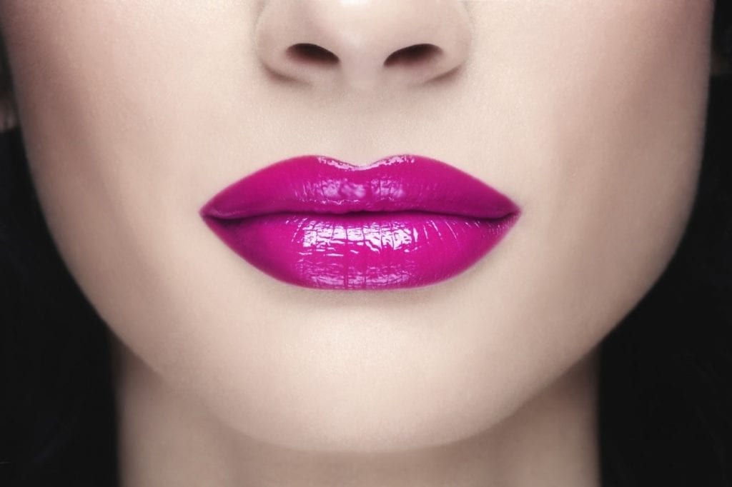 woman with full, glossy, plump lips