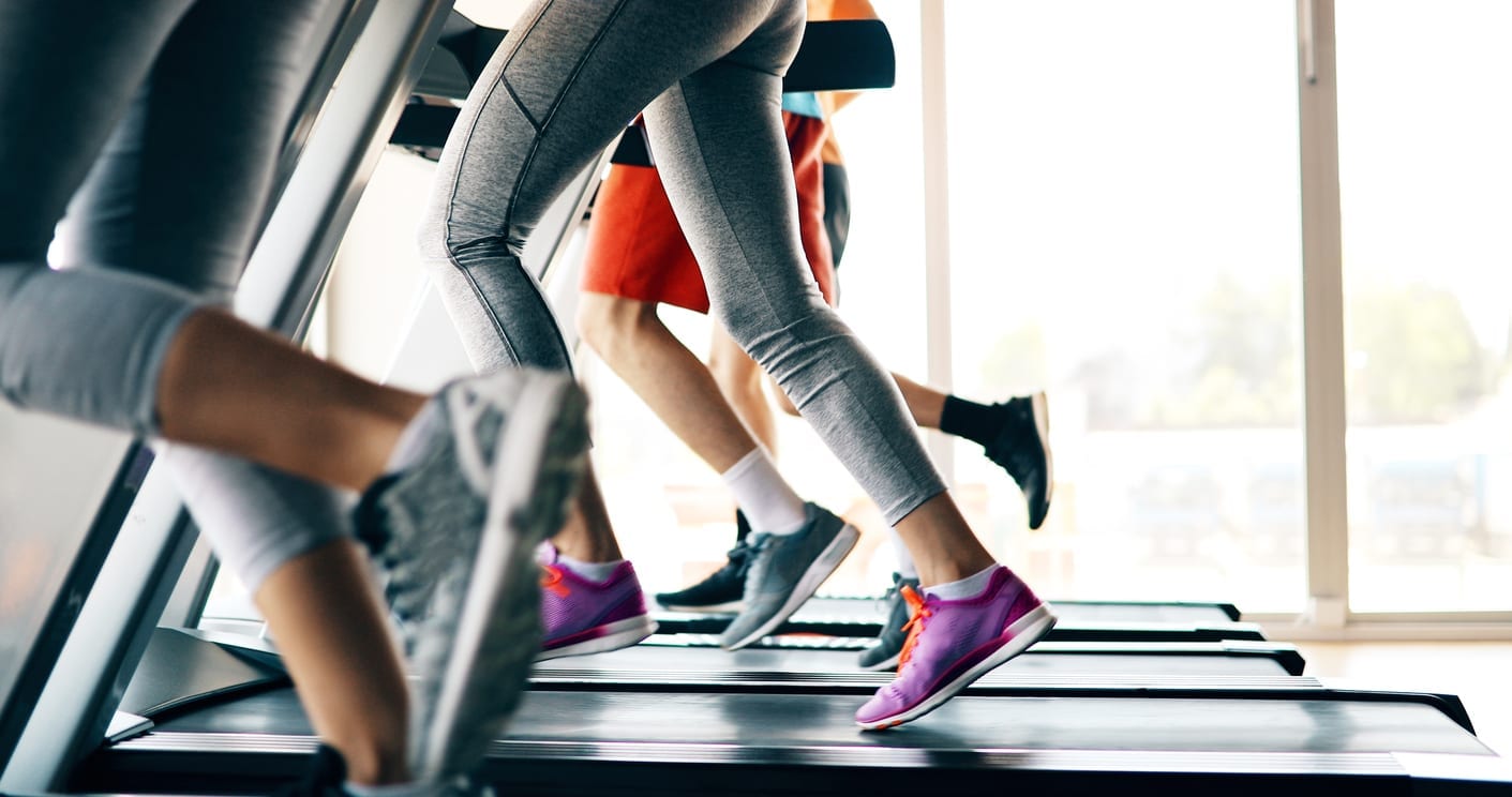 exercising after surgery - people doing cardio training on treadmill in gym