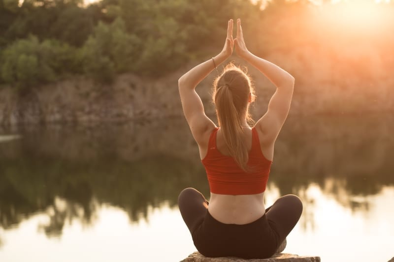 exercising after surgery - woman doing yoga