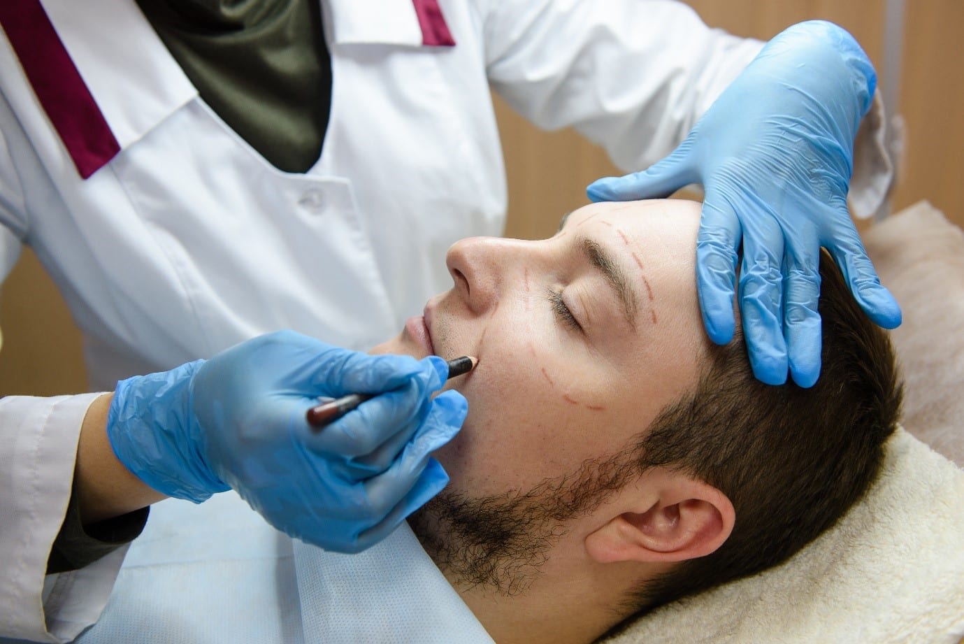 man receiving cosmetic treatment