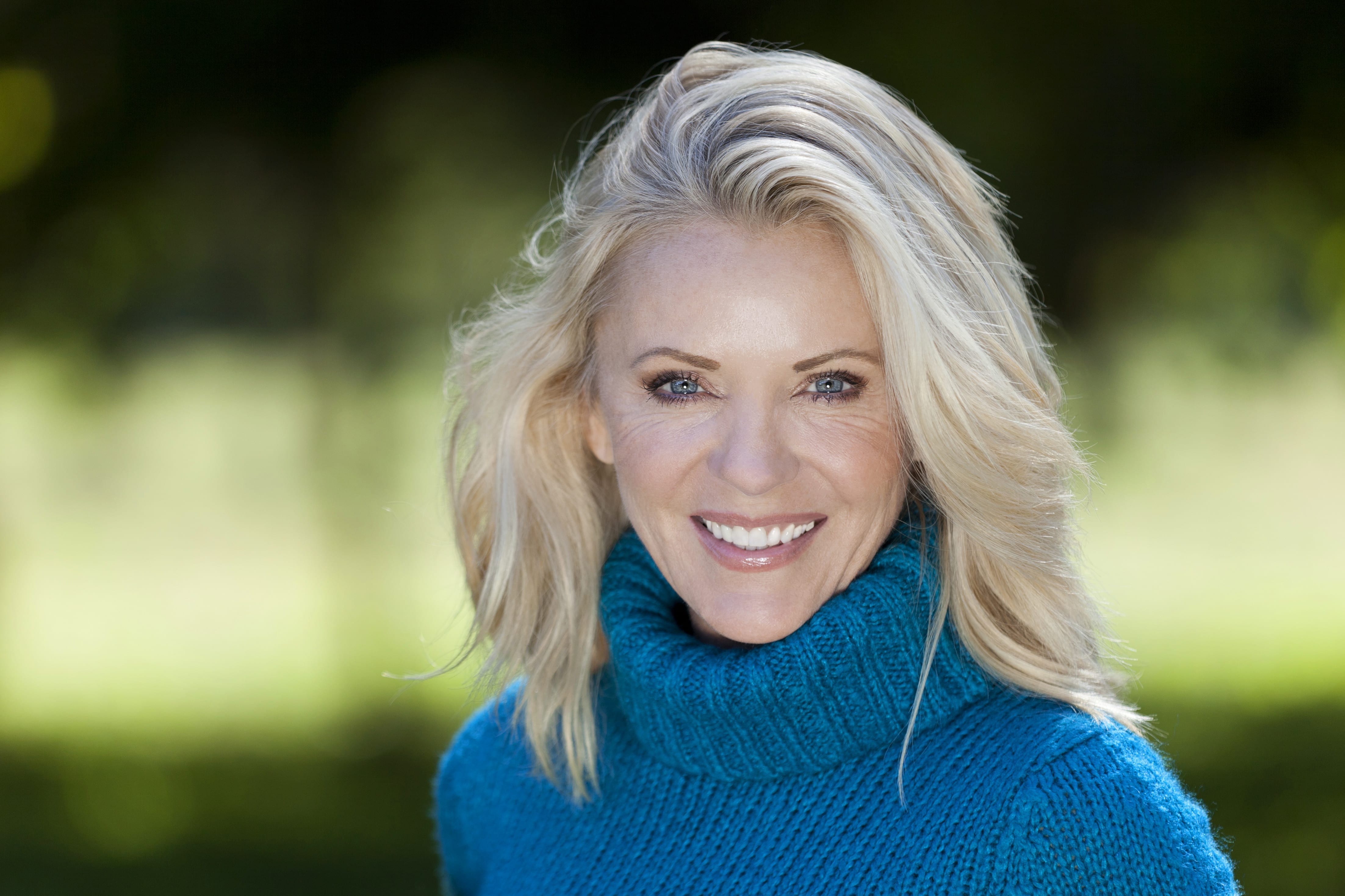 confident woman smiling at the camera