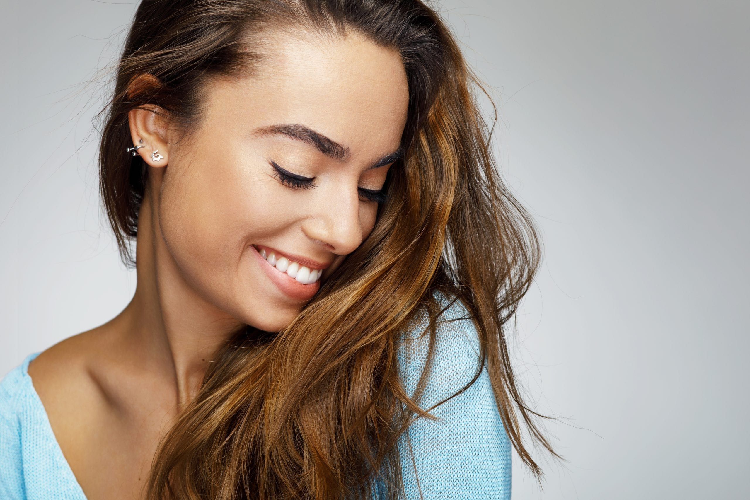 Portrait of a young woman with a beautiful smile