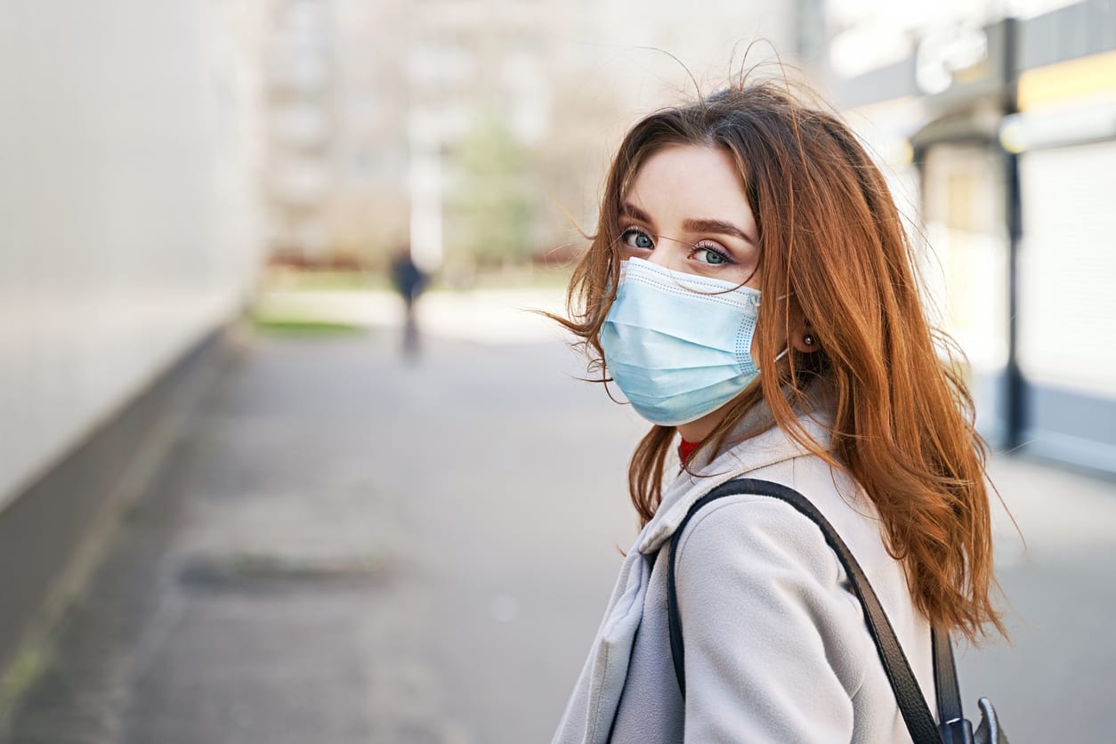 woman wearing mask on street