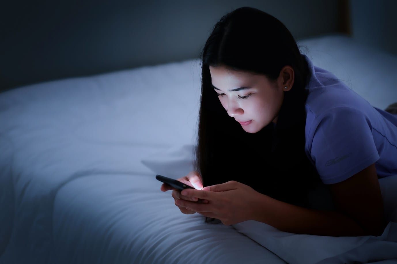 woman staring at screen