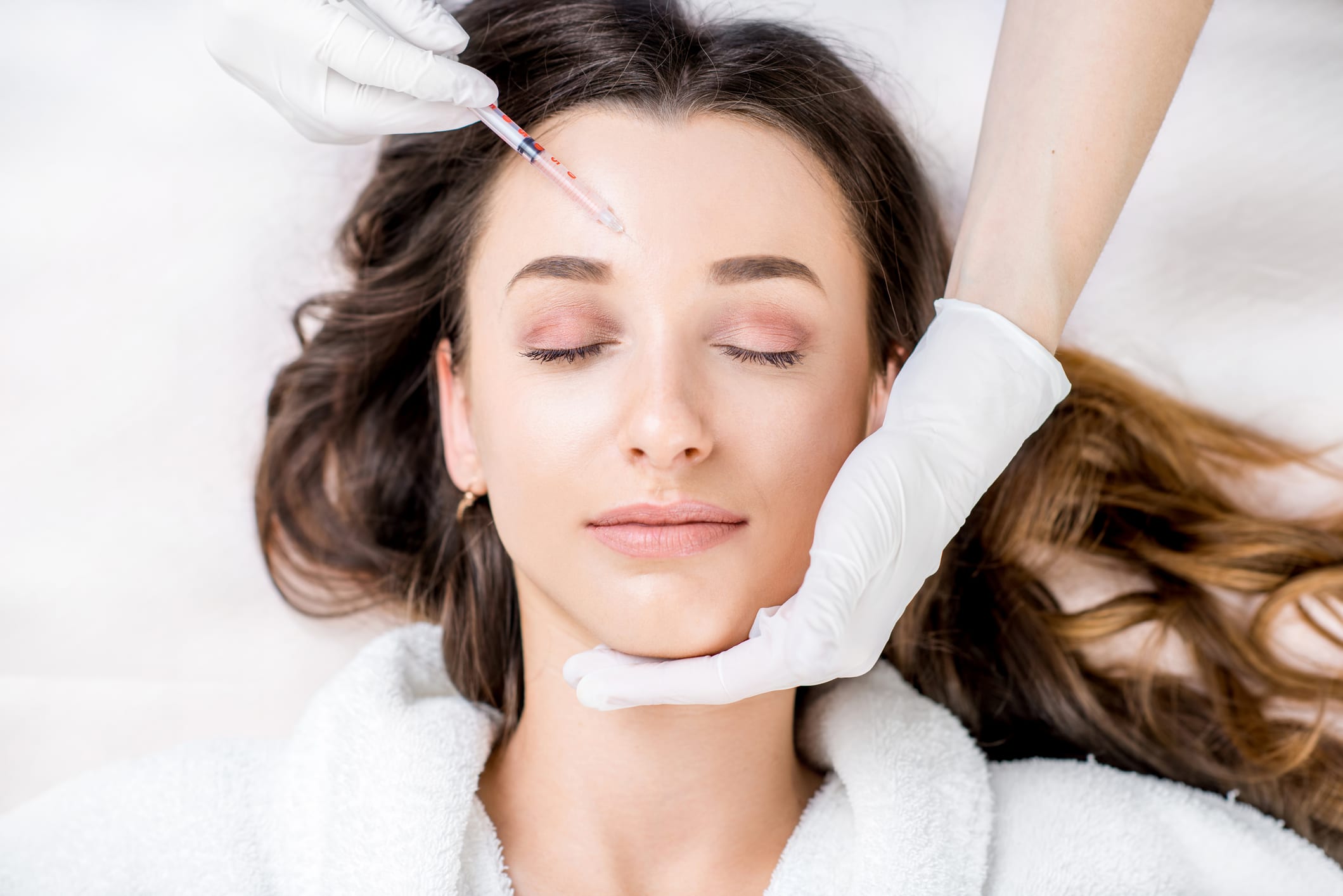 Woman receiving an anti-wrinkle injectioninjection