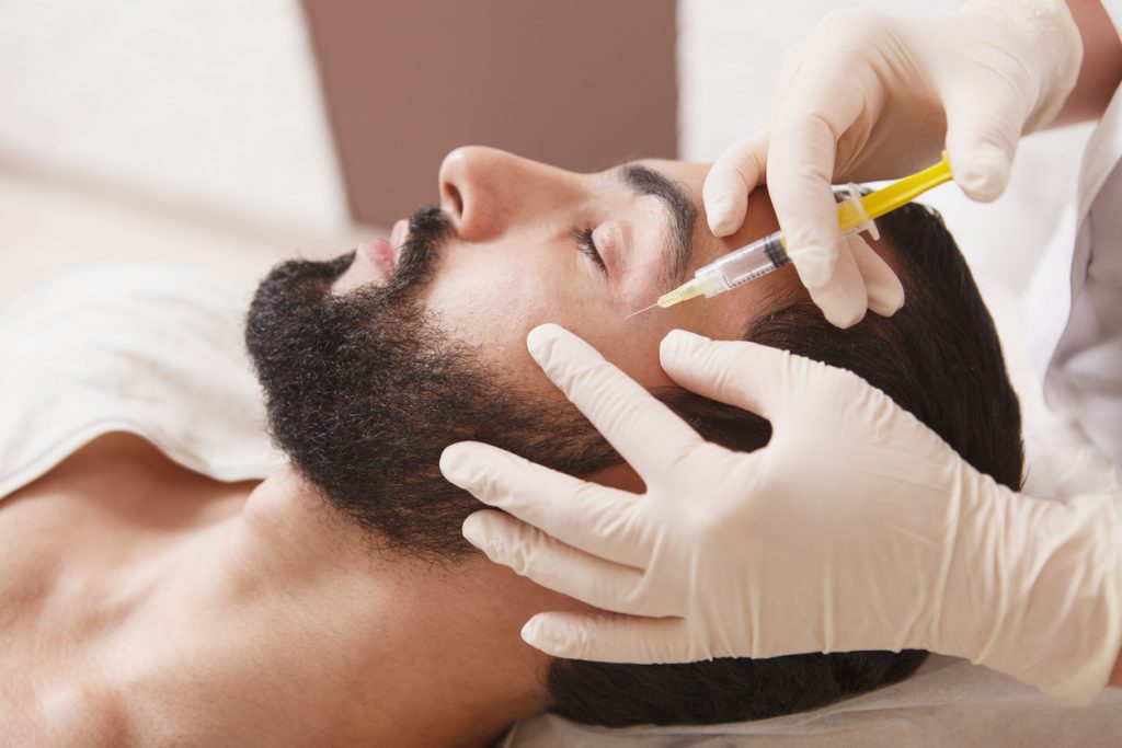 Men getting cosmetic injections