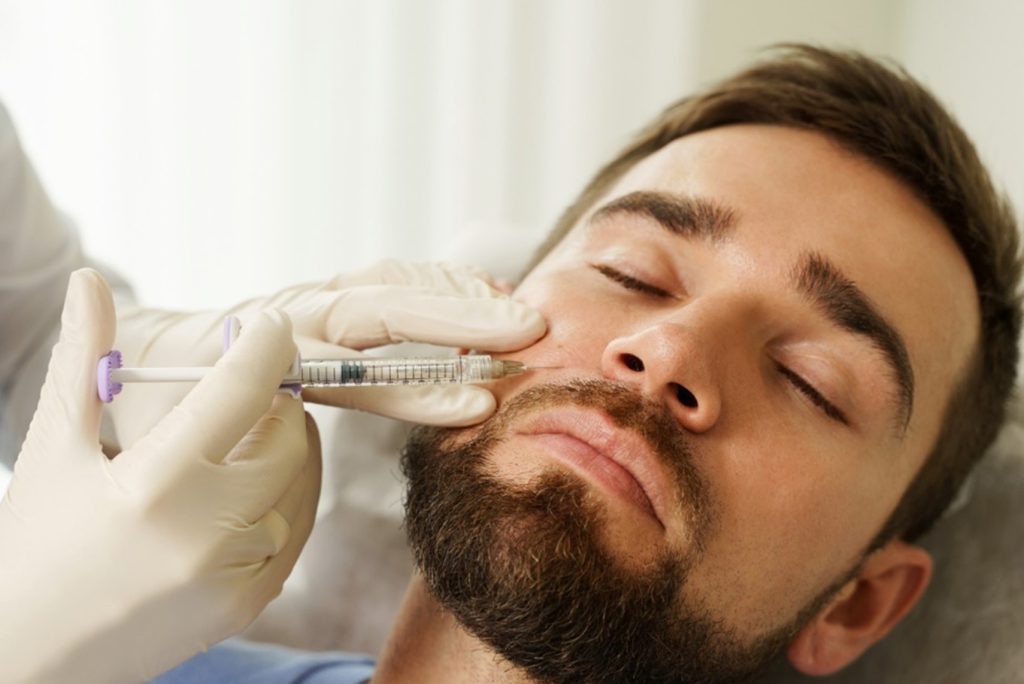 Man being injected with dermal filler
