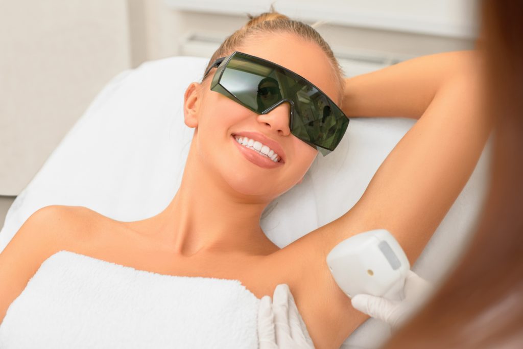 Woman getting ready for her laser hair removal on the underarms