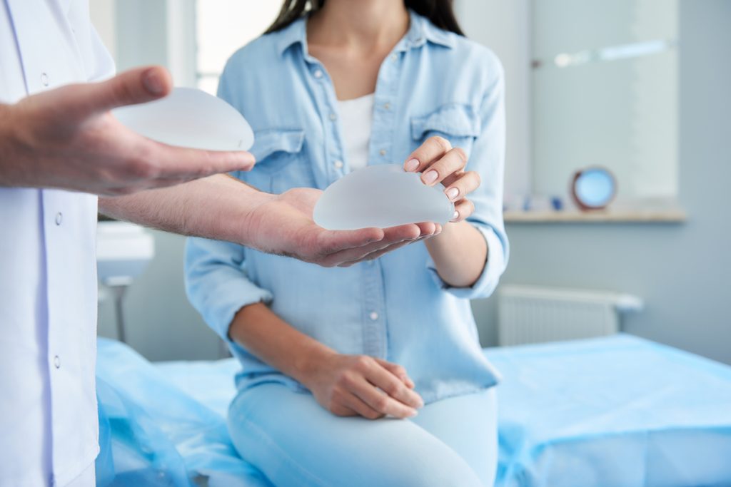 Woman choosing breast implants