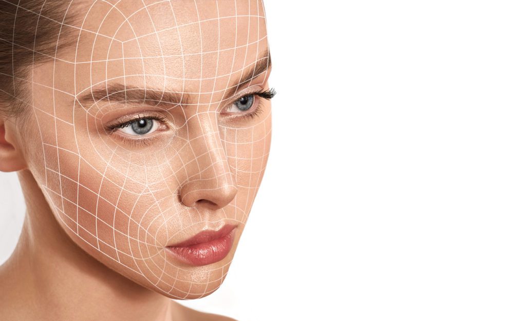 Woman with face mapped out ready for facial fillers