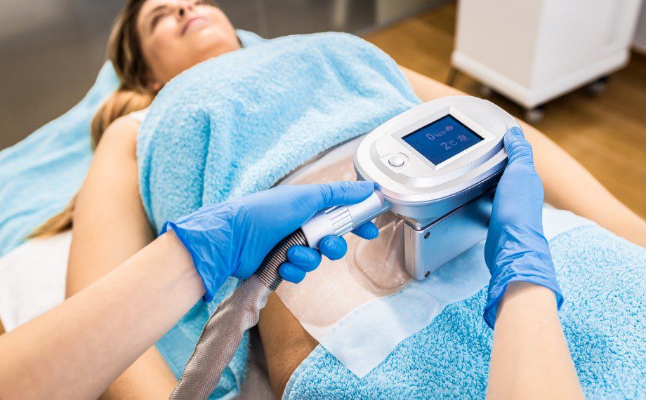 Woman having a fat freezing procedure