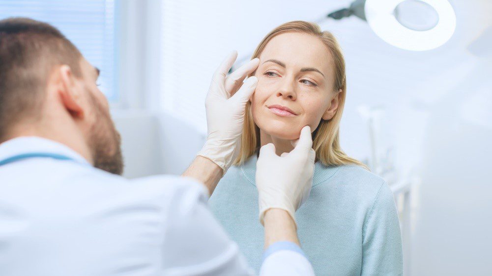 A woman having a chin consultation