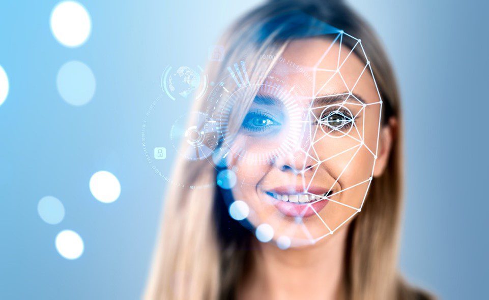 woman smiling with facial recognition on her face